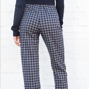 Dark blue and white tilden checkers brandy melville zip up pants.